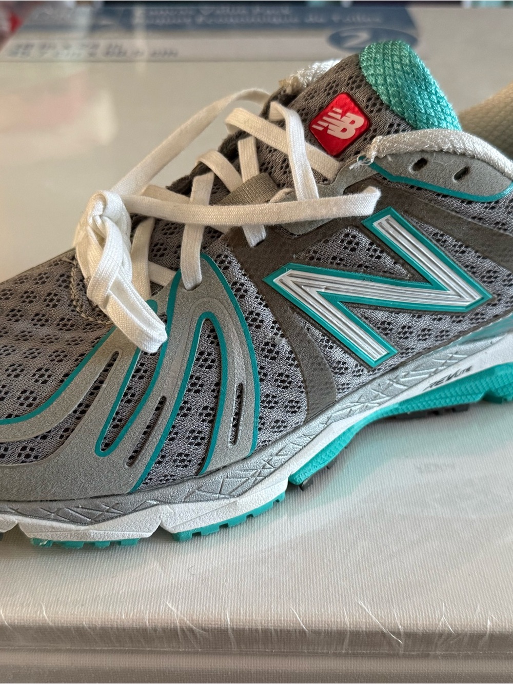 AMPUTEE-ONE LEFT SHOE-New Balance Women's Gray and Teal Athletic Running Sneaker
